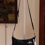 Coach Black Leather Shoulder Bag with Gold Accents Photo 0