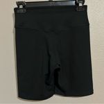 Nike  dri fit black swoosh logo biker shorts women’s size small Photo 4