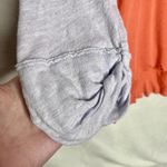 Free People  We the Free Star Relaxed Distressed Henley Top Orange Linen Small Photo 9