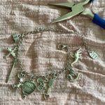 Silver Charm Bracelet with Unique Pendants Photo 4