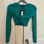 Pretty Little Thing Textured Cutout Twist Front Crop Top Photo 1