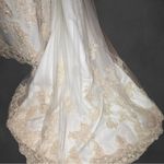 David's Bridal . Style T8818 size 10 wedding dress. 
Worn once. Was cleaned. Photo 2