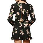 Urban Outfitters Pins & Needles floral keyhole back ruffled long sleeve romper S Photo 1