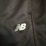 New Balance  athletic pants Photo 1