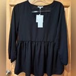 Mary Square V neckline and a gathered, peplum Photo 0