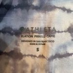 Athleta  Elation printed capri legging Tahiti dusk purple size small Photo 7