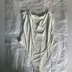 Forever 21 Elegant Cream Bodysuit Photo 0