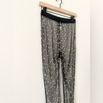 Amazon  Sheer Long Sleeve Top and Pant Set Black with Pearl Detail - Size M Photo 5