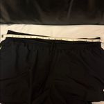 Nike  Women's Black and Yellow Athletic Shorts Photo 3