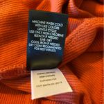 Torrid  Short Sleeve Twist Knot V-neck Fit & Flare Ribbed Dress in Burnt Orange Photo 6