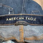 American Eagle  Super Hi Rise Jegging 4 Regular Denim Dark Wash Distressed Photo 2