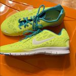 Nike  Vibrant Green and Blue Athletic Shoes Photo 1