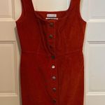 Urban Outfitters size 4 cute orange denim dress. So cute with long sleeves tank underneath. Photo 0