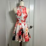 Bebe Watercolor Floral Sleeveless
Scuba Fit and Flare Mini Skater Dress Photo 2