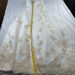 David's Bridal . Style T8818 size 10 wedding dress. 
Worn once. Was cleaned. Photo 9