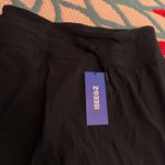 Iseegz. Women's High Waisted 15'' Swim Skirts Tummy Control Bathing Suit Skirt Bottoms Swimsuit with Liner Pockets Photo 10