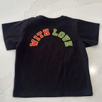 With Jean Black “” T-shirt Photo 2