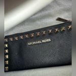 Michael Kors  Womens Saffiano Leather Stud Long Zip Clutch with gold tone studs. Photo 9