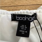 Boohoo - Ruched Stretch Satin Ruffle Mini Skirt in White Photo 2