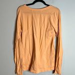 Athleta  apricot long sleeve athletic top Photo 2