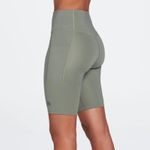 The North Face  Women's Motivation Pocket 9” Bike Shorts in Agave Green Small Photo 1