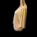 Fabletics  flourescent yellow and purple swirls on a cream tee. NWOT. Photo 3