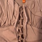 Off The Shoulder Cut Out Pink Shirt Photo 3