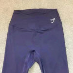 Gymshark  dark purple leggings in size medium Photo 1