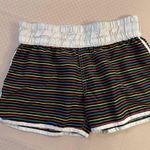Billabong vintage black rainbow striped board swim shorts with white trim. M. Photo 7