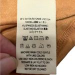 Urban Outfitters  yellow orange long bell sleeve blouse size large Photo 7