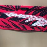 Volcom New.  red tropical print twist front bikini top. Photo 4