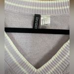 Divided Soft, cable-knit, v-neck sweater with long sleeves. Light purple. Size Small Photo 2