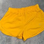 Nike  Women's Vibrant Yellow Athletic Shorts Photo 0