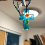 Handmade Glass cross with ribbon necklace. Photo 1