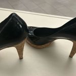 Nine West Black and Tan High Heels with Pointed Toe and Elegant Silhouette Photo 0