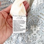 Foxiedox Lace V-Neck Cropped Jumpsuit in Ice Blue Photo 8