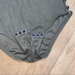 onetheland bodysuit cutout side detail Photo 2