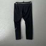 Nike  Women’s Black Capri Leggings Medium Athletic Logo Workout Pants Photo 3