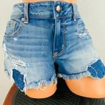 American Eagle Womens 12 360 Super Stretch Shortie AEO Denim Peekaboo Shorts Photo 0