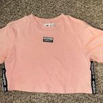 Urban Outfitters  adidas pink cropped tshirt Photo 0