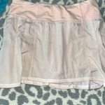 Lululemon  ruffled skirt, size 2, and a light pink color Photo 0