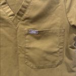 FIGS  Women's Technical Collection Scrub Shirt Color Green Size XS Photo 1