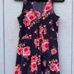 Navy floral romper with pleated pockets Photo 2