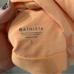 Athleta  Concious Cut Out Crop Top Sports Bra Peach Orange Size Large Photo 3