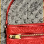 Fossil  red cowhide leather wristlet zip around wallet 4 credit card spots pouch Photo 1