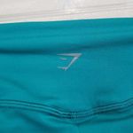 Gymshark Women's High-Rise Seamless Stirrup Illumination Gym Legging in Green Photo 5