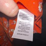 a.n.a  Women’s Vibrant Orange Floral Elbow Jumpsuit Romper Photo 6