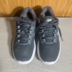 Nike  Gray and White Women's Sneakers Photo 1