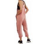 Free People  Movement Hot Shot Jumpsuit in Petal Size L. NWT Photo 1