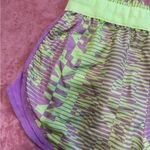 Nike Purple and Green Athletic Shorts with Curved Hem Photo 6